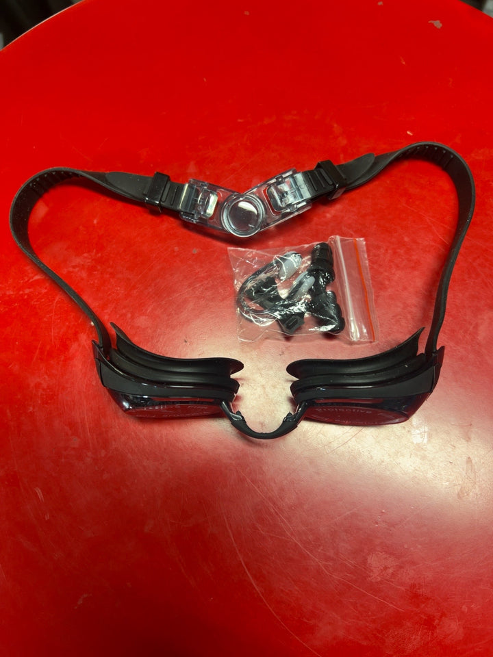 Black strap swimming goggles with dark lenses and accessory bag